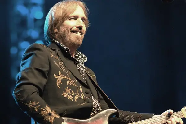 guitarist tom petty with an SG guitar