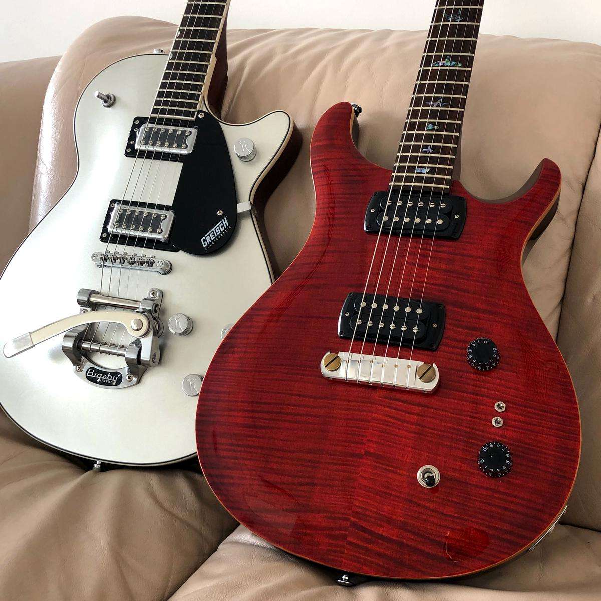 A lineup of influential guitarists, visually representing their impact on music.