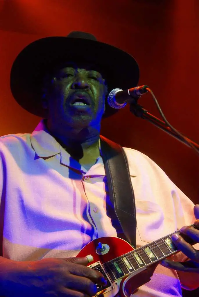 Magic Slim With a Red and White Guitar
