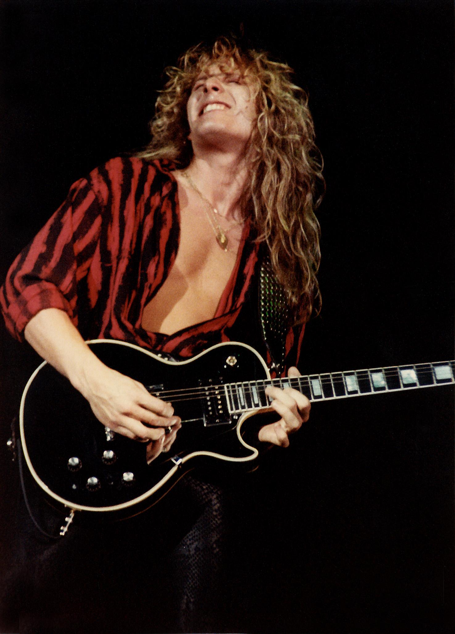 John Sykes: A Legacy Forged in Fire - Exploring His Guitar Mastery and Iconic Songs